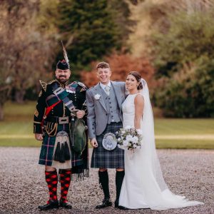 Wedding Bagpiper Jason Faulkner playing for Jody and Danny's wedding at The Loch Ness Country House Hotel.